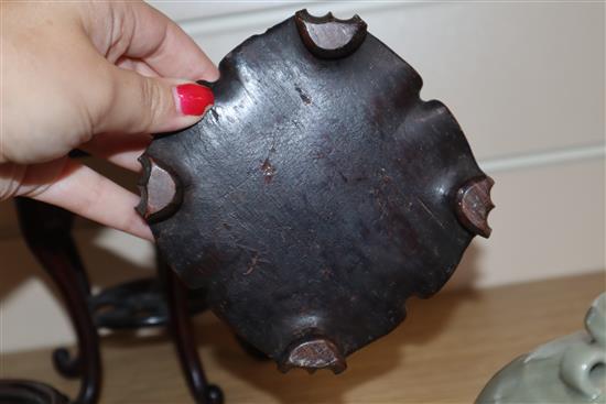 A group of seven Chinese carved wood stands, 19th / 20th century